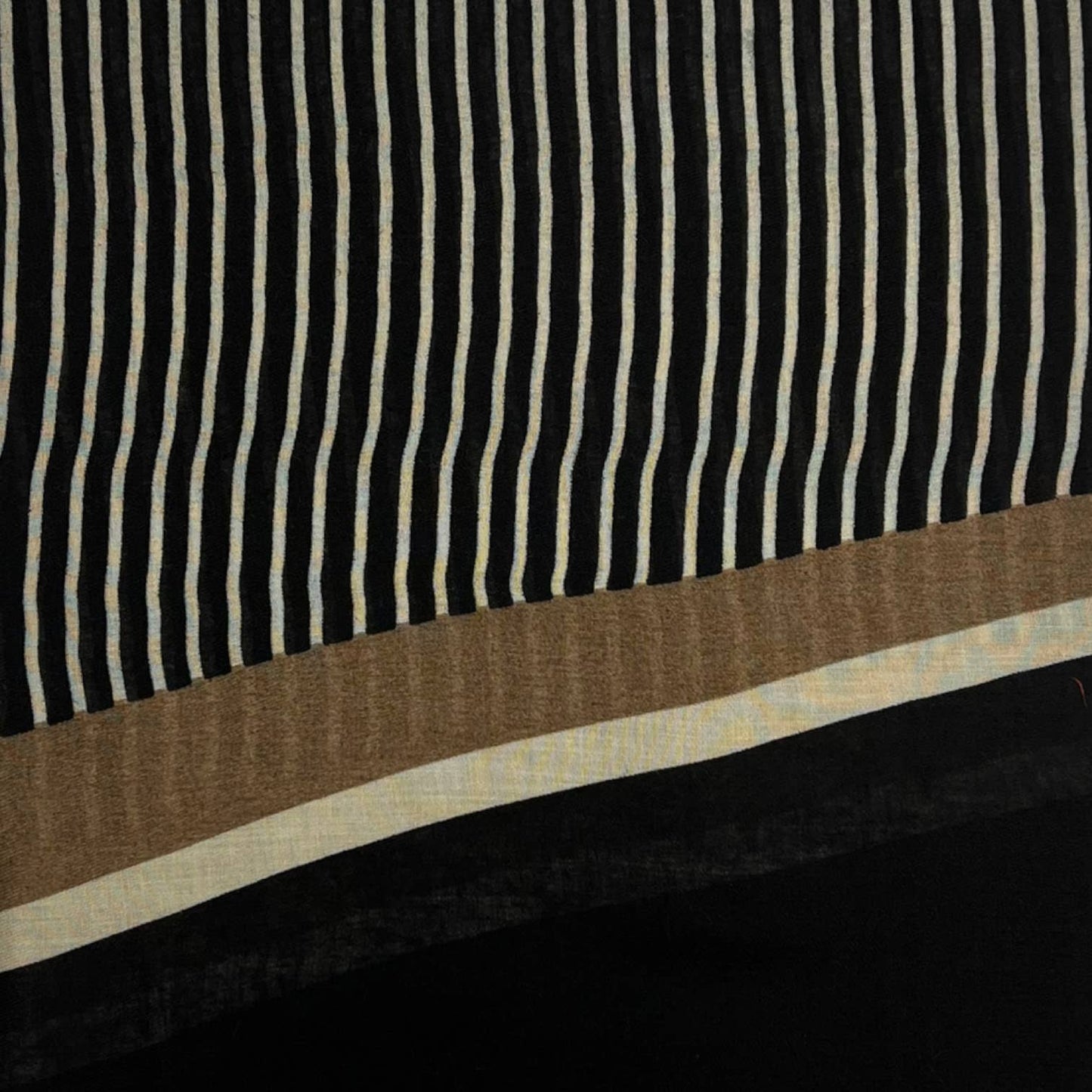 Vertical striped on printed scarf finished with fringes