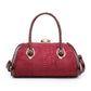 LM053-1 Hard case handbag with snake skin pattern