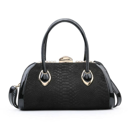 LM053-1 Hard case handbag with snake skin pattern