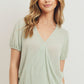 Textured knit surplice bottom string short sleeve top